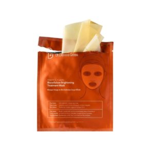 Bilde av Dr. Dennis Gross C+ Collagen Biocellulose Treatment Mask emballasje fremstilt på en ren bakgrunn, highlighter den avanserte formuleringen og hudfordelene.